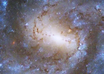 Hubble Telescope captures star-packed galaxy spinning like a top